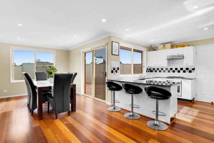 Spacious Family Home in Mount Annan with Modern Features and Backyard