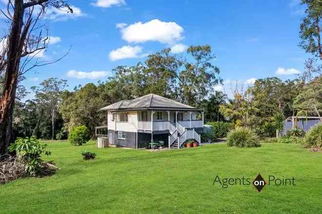 Charming Queenslander on 1.3 Acres with 2 Bedrooms