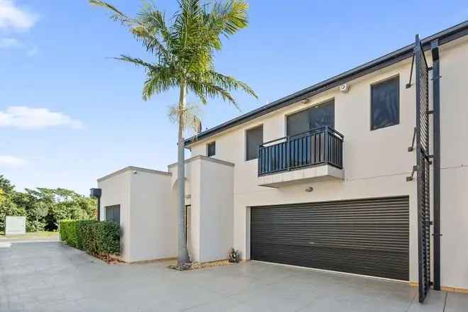 Tuscan Inspired Duplex in Blackbutt with Manicured Gardens and Courtyard