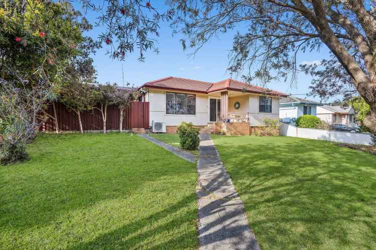 Well-Maintained Single-Story Home with Development Potential Near Lake and Beach