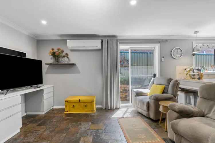 Buy Level Home with Self Contained Studio in Mollymook