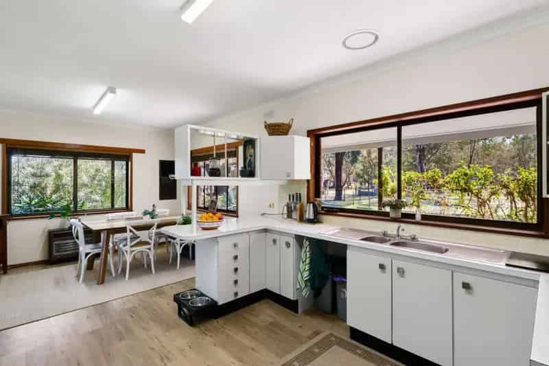 Buy rural property family home in Euroa with spacious bedrooms and gardens