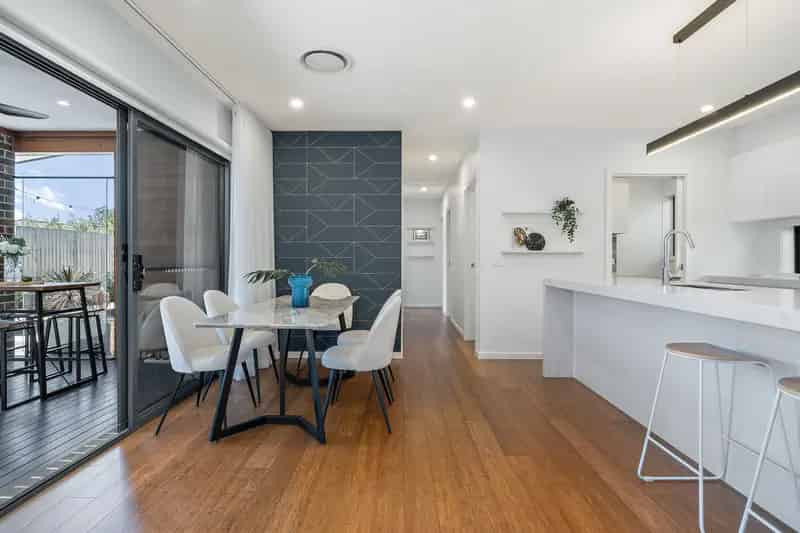 Lifestyle home with in-ground heated pool and green surrounds