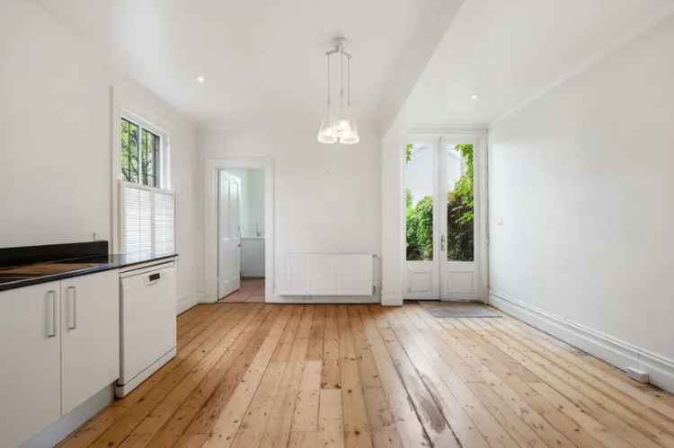 Buy Victorian Terrace in East Melbourne with Courtyard and Parking Permits