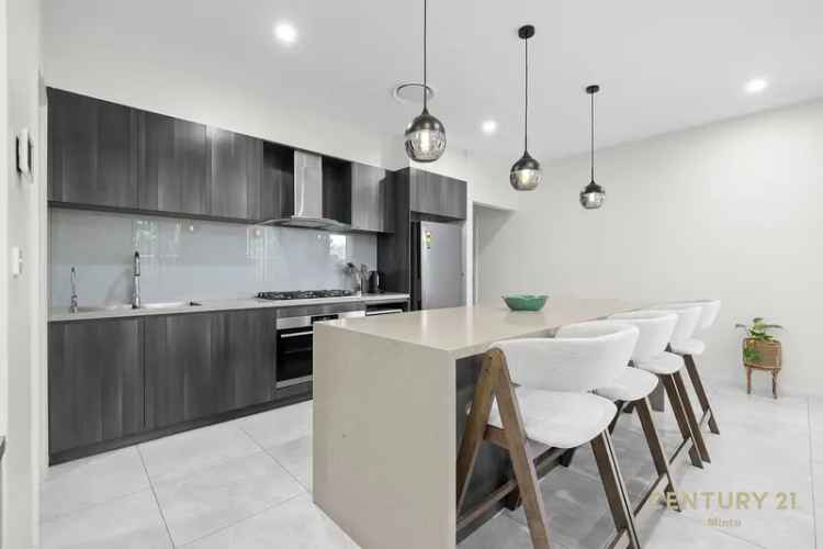 For Sale House in Oran Park with Four Bedrooms and Modern Kitchen