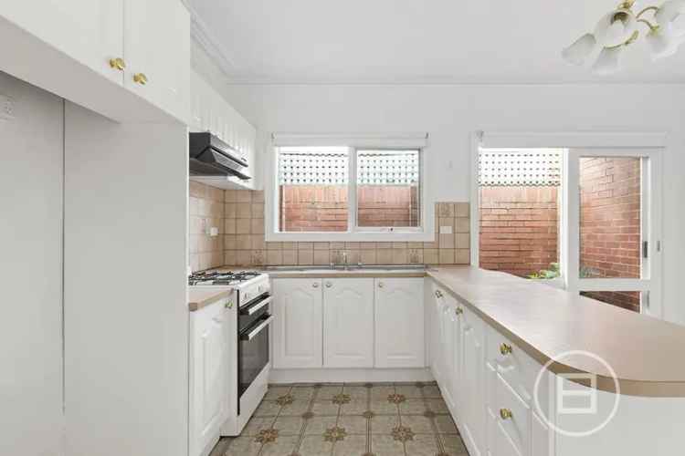 Buy Victorian home in South Melbourne with charming features and courtyards