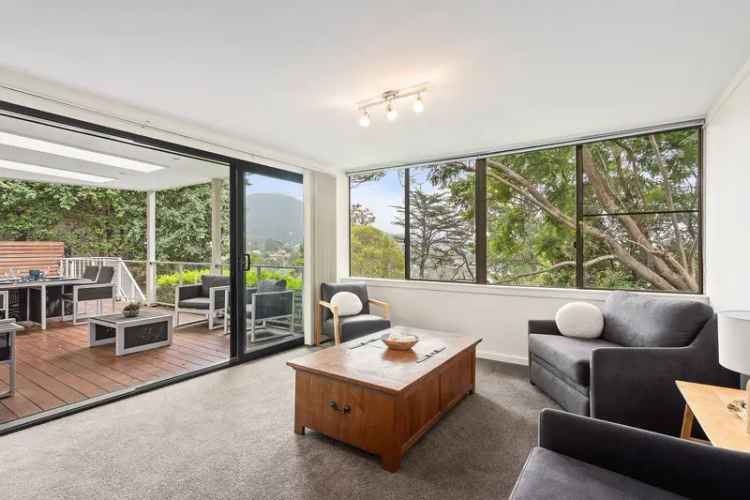 Private Family Home Near Mount Keira with Smart Features