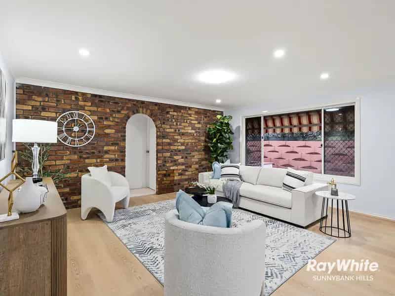 ALL-SEASON ENTERTAINER WITH A CHIC RENOVATED INTERIOR