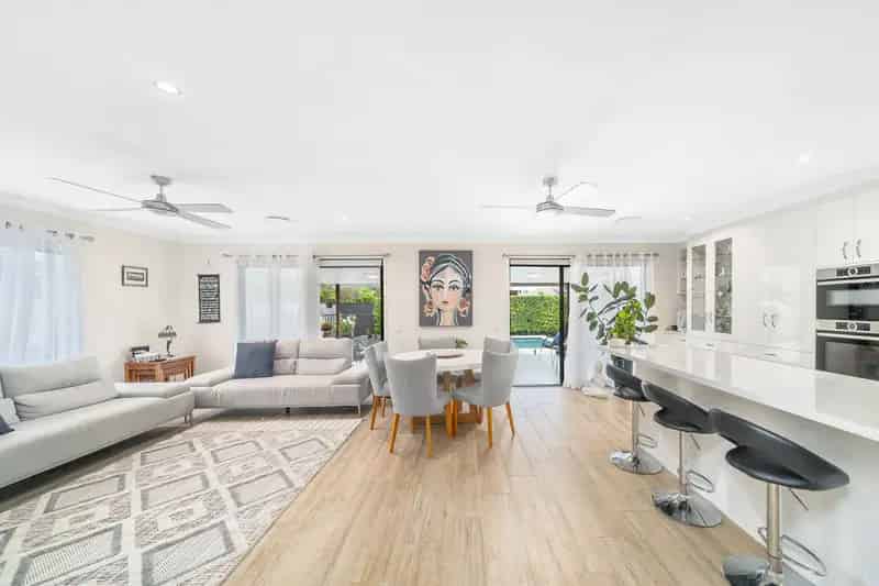 Spacious Brick Home with Expansive Pool and Convenient Side Access