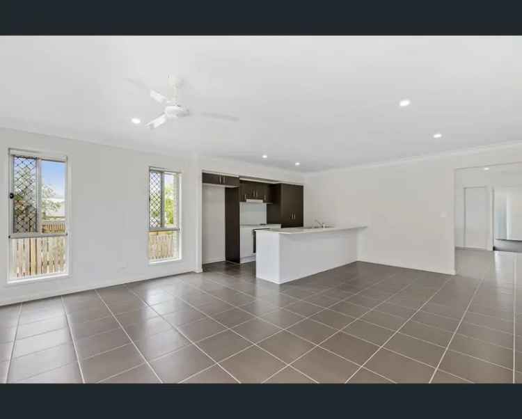 4 Bedroom Family Home in Springfield Lakes