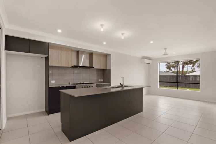 Stunning Family Home in Logan Reserve - 4 Beds, 2 Baths, Modern Upgrades