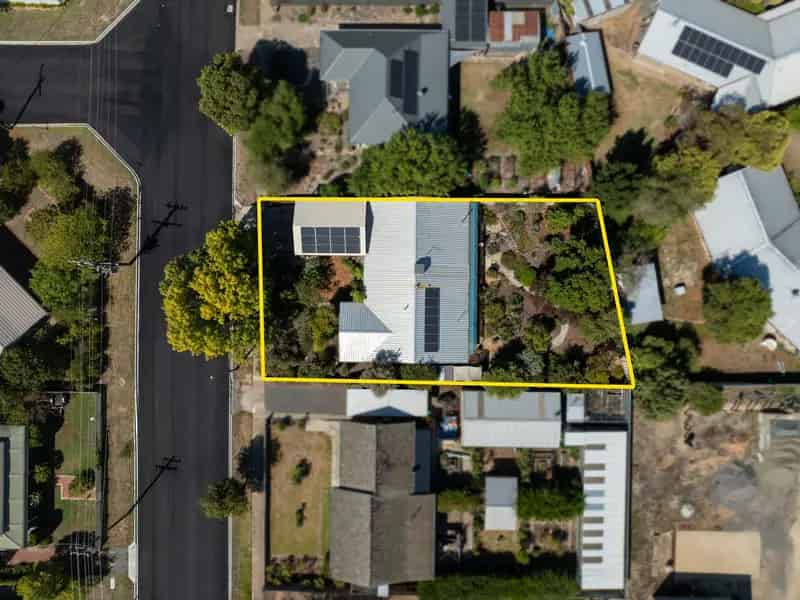 Brick Veneer Home with Endless Potential in Prime Location