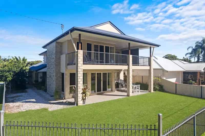 Waterfront Paradise with Side Access, Pool & Dual Living Potential!