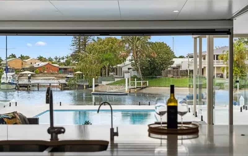 Circumstances require a timely sale. Minyama's best opportunity with length of canal views.