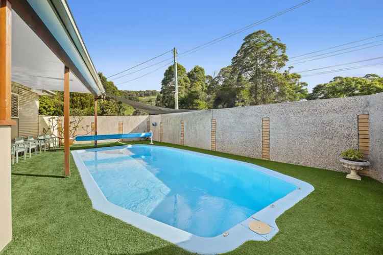 Buy house in Coffs Harbour with pool, shed, and large yard