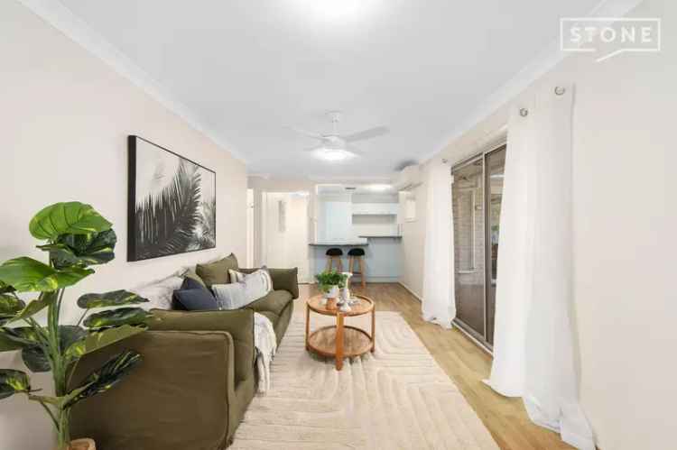 Buy House in Valentine NSW with Multiple Living Spaces and Reserve