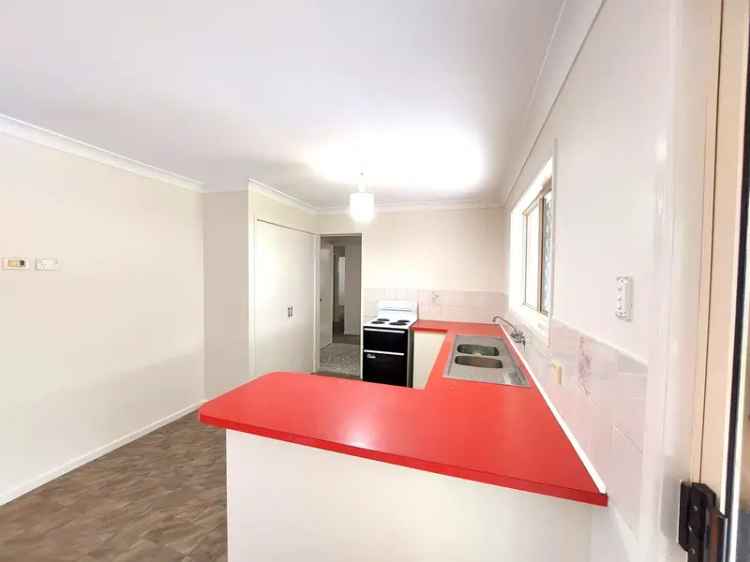 Lease neat three bedroom home in Boronia Heights with backyard