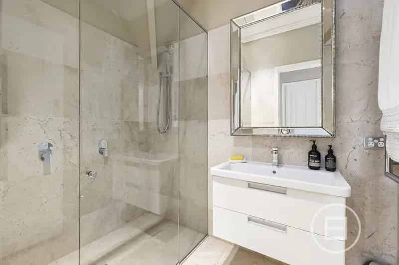 Buy Tudor House in Melbourne with Renovated Features and Private Garden