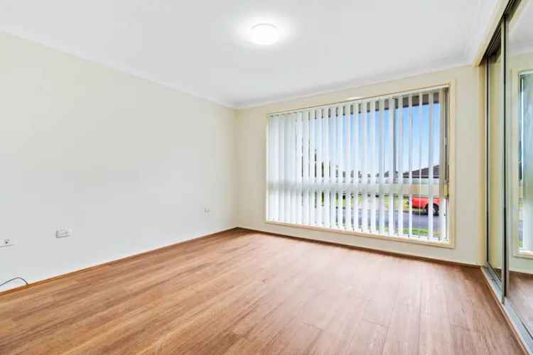 For Lease Spacious Four Bedroom House in Minto NSW with Backyard