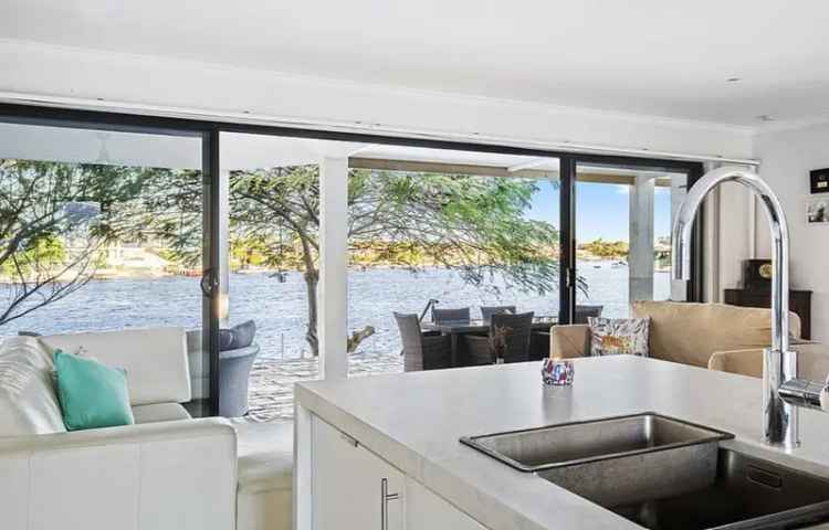 Rent waterfront family home in Mermaid Waters with modern features