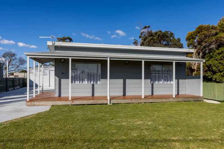 Buy fully refurbished two bedroom home near Ninety Mile Beach