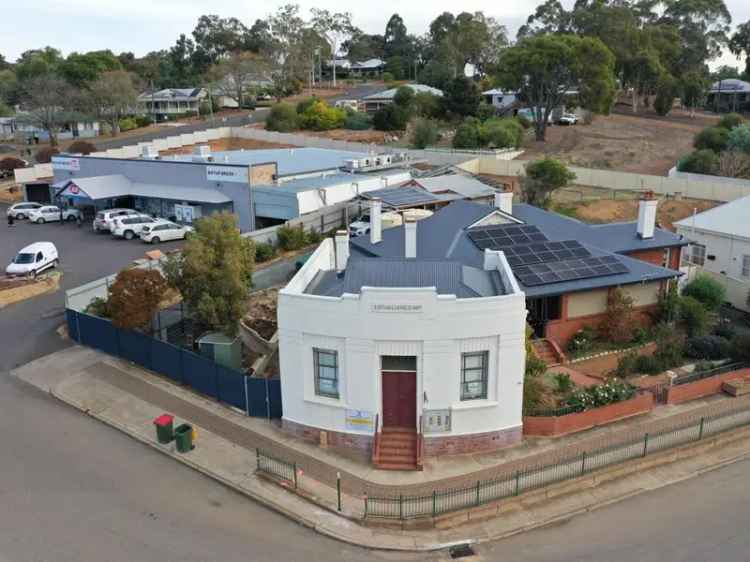 Art Deco Home with Commercial Potential and Large Backyard