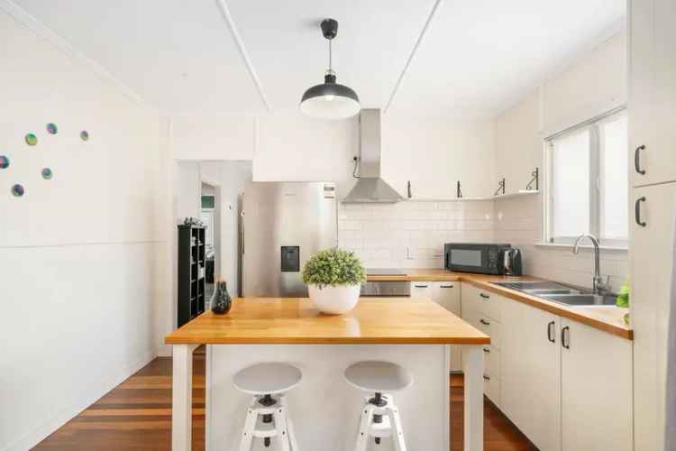 Coastal Character Meets Contemporary Flair - Elevated Queenslander in Prime Redcliffe Position