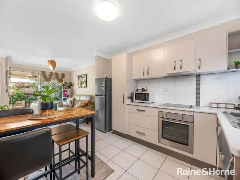 Buy townhouse in ideal location with spacious living and low maintenance features
