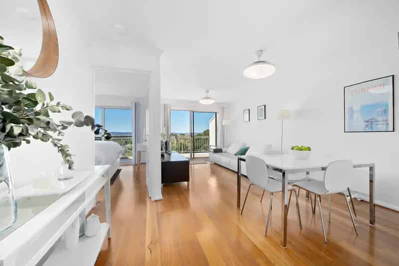 Perfectly designed top-floor apartment overlooking golf course with expansive views.