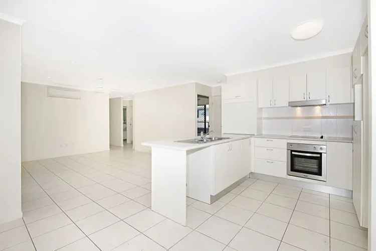 Buy large family home in Mt Louisa with spacious rooms and modern features