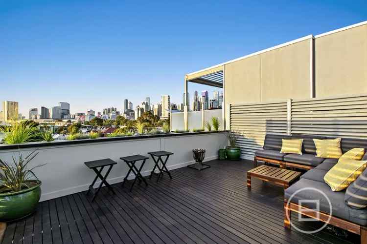 Buy multi-level home in Melbourne with three bedrooms and rooftop terrace