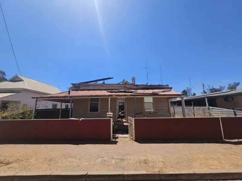 For Sale: Fire-Damaged Property Requires Demolition