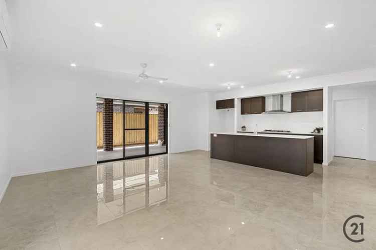 House For Sale in Yarrabilba with 4 Bedrooms and Modern Features