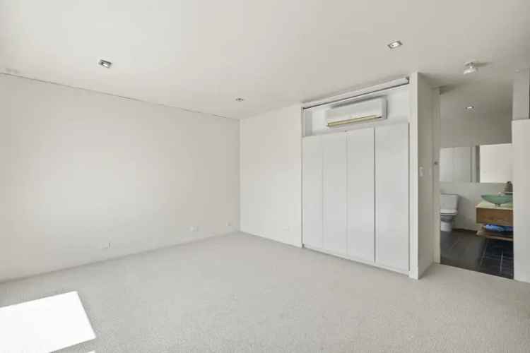 Rent Two Bedroom House in East Melbourne With Private Courtyard