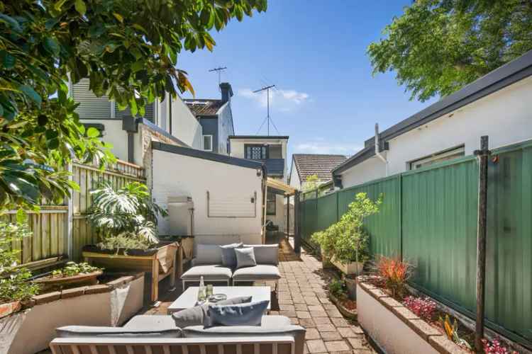 Dual-level Victorian cottage with freestanding rear studio