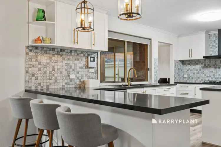 Family Comfort and Style with a Stunning Renovated Kitchen