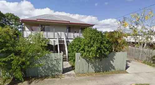 Family Home with Enclosed 4 Car Space!