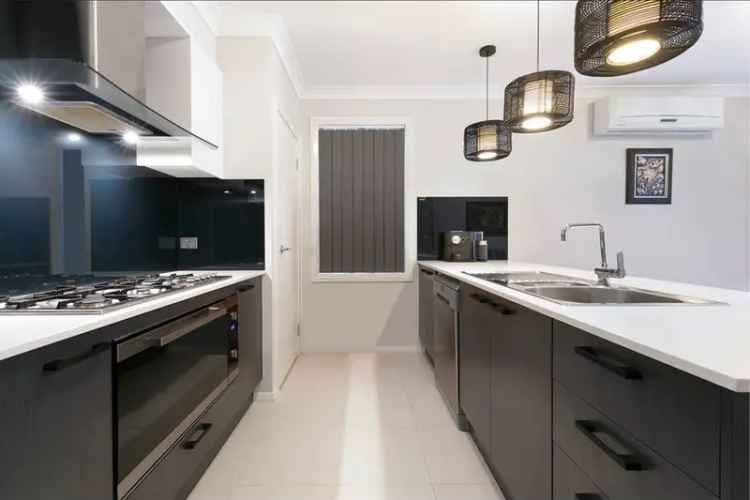 Auction Buy Family Home in Glenmore Park with Modern Features and Convenience