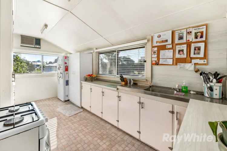 Buy Weatherboard Residence in Serene Area with Character and Comfort