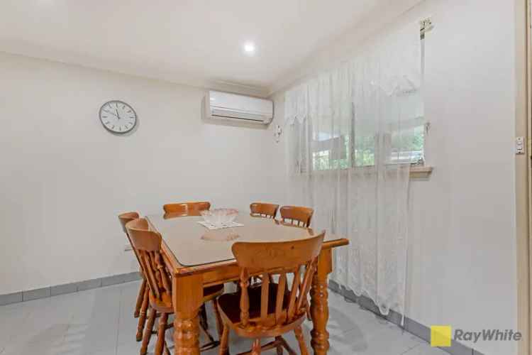 Buy Family Home in Peaceful Suburb with Entertaining Features