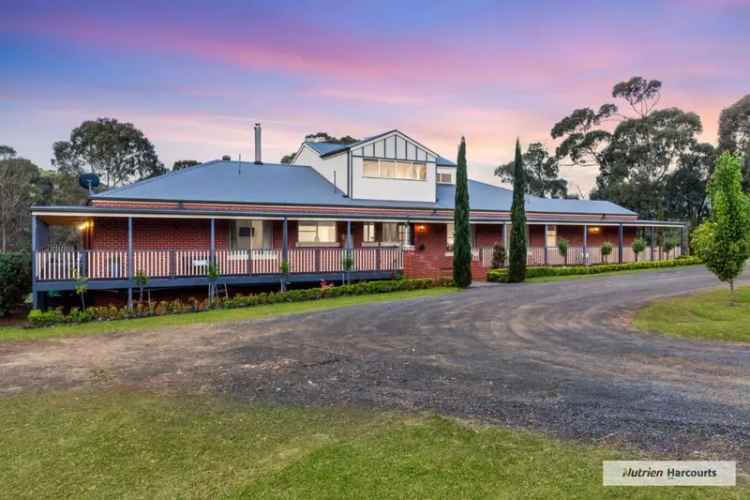 Buy rural property in Wandong with six bedrooms and stunning gardens