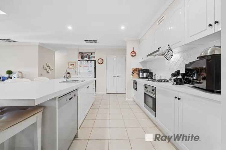 Spacious 4-Bedroom Family Home with Multiple Living Zones and Entertainer's Appeal