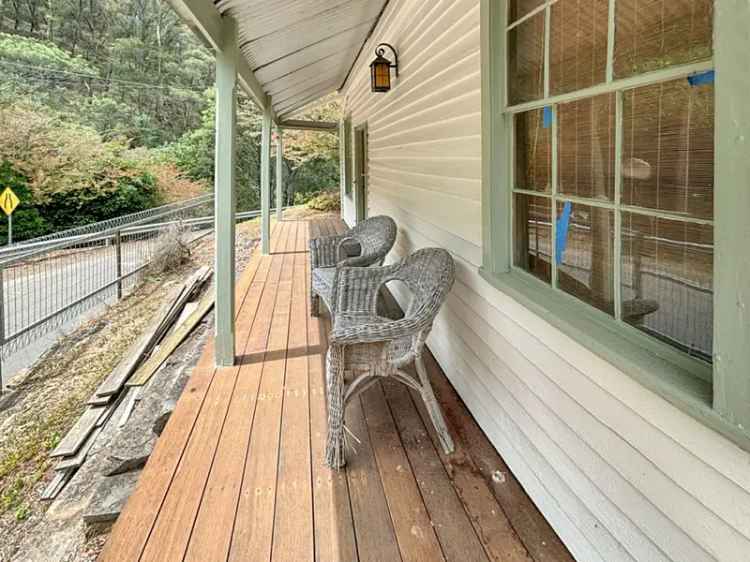 Buy a historic cottage in High Country with original features and charm