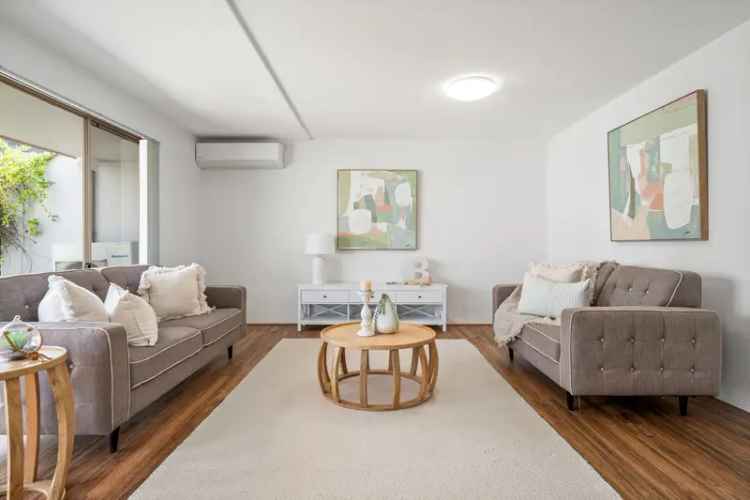 Leafy outlook, low-maintenance living near Lake Ginninderra