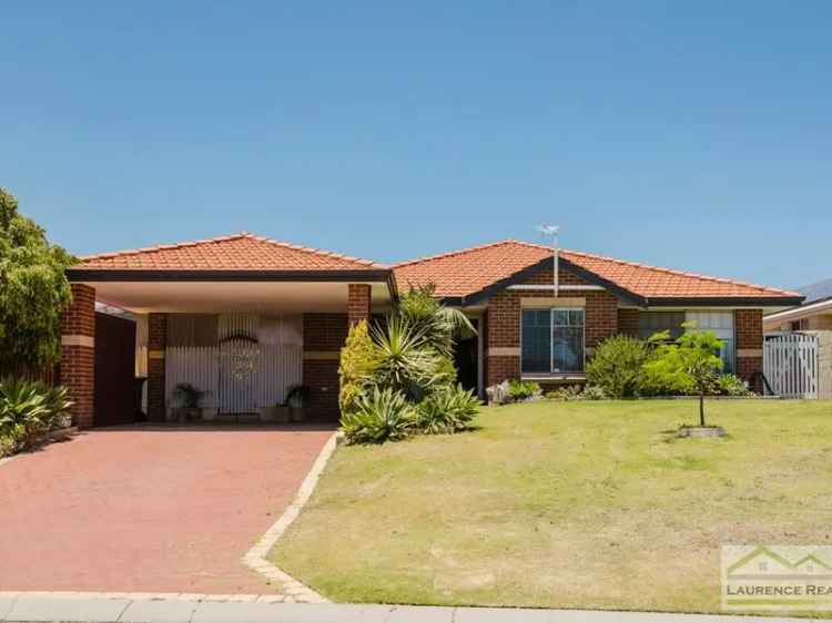 Mindarie Family Home 4x2 Plus Study Near Schools and Beaches