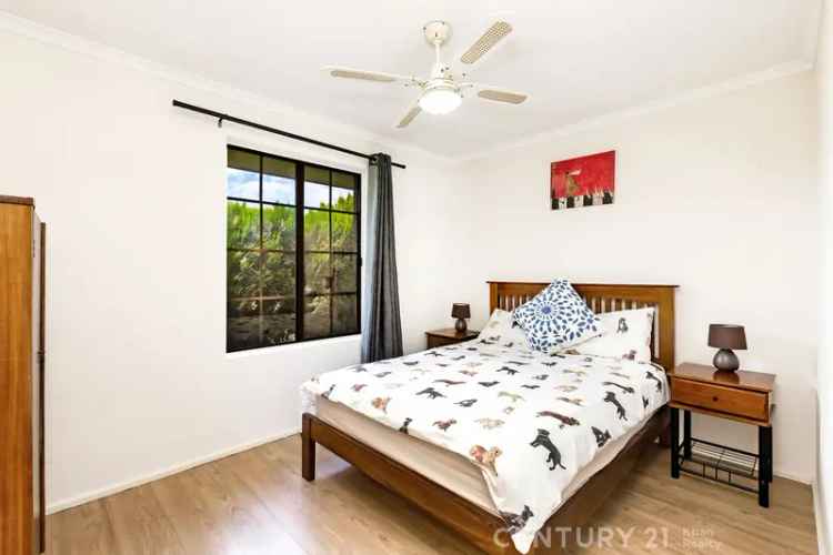 House For Sale in Morphett Vale with Four Bedrooms and Spacious Backyard