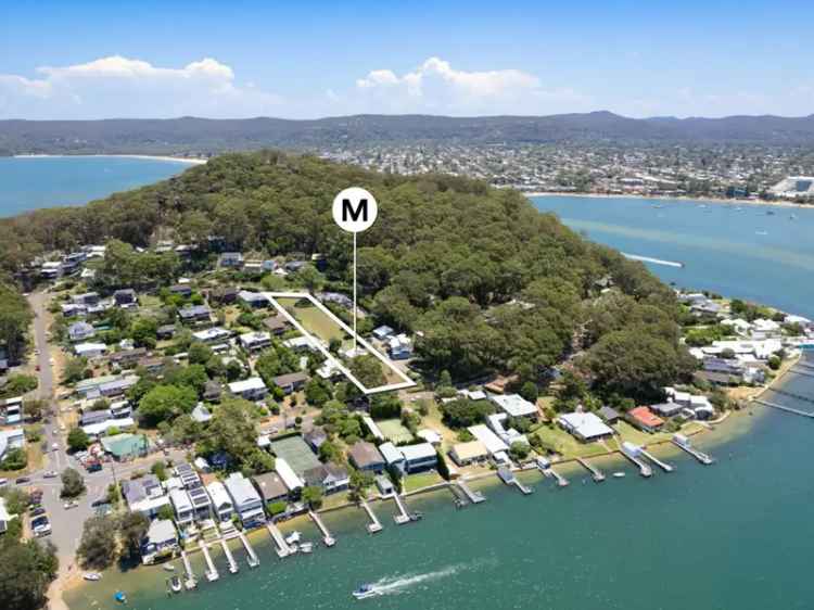 Buy land in Wagstaffe with stunning water views and development potential