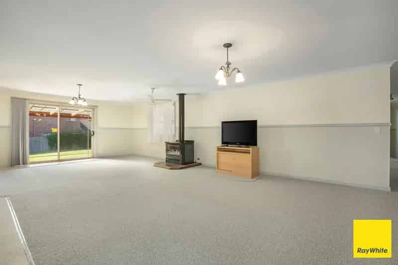 Buy House in Armidale with Spacious Family Living and Entertaining Areas