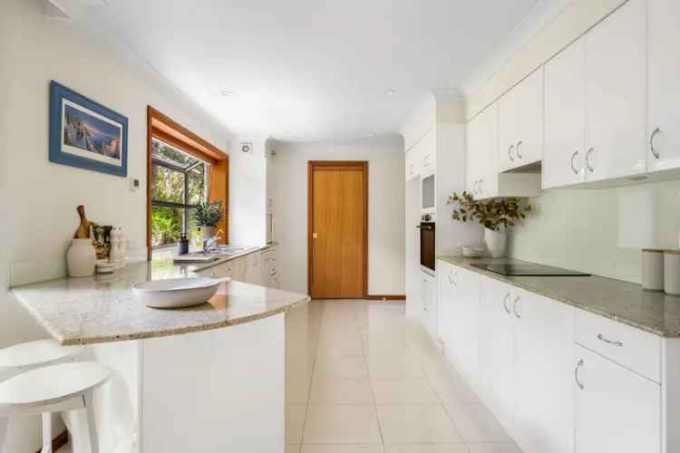 Buy House in Castlecrag with Bushland Vistas and Family Features