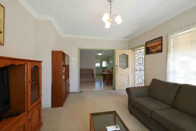 Charming 3-Bedroom Brick Unit with Spacious Yard